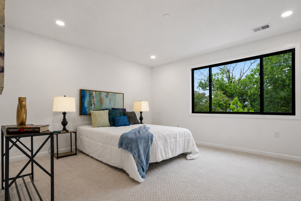 Staged Bedroom Rental Property Washington DC Staged bedroom Washington DC rental property with modern decor, natural light, and neutral tones