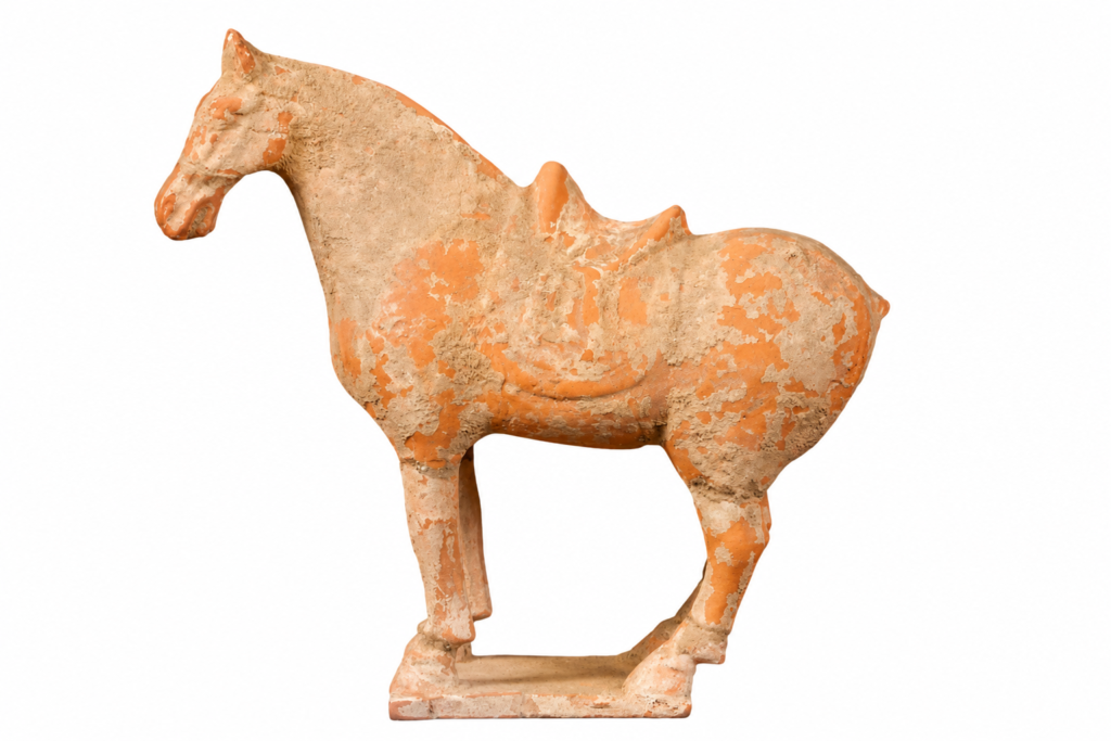 Weathered terracotta horse sculpture with textured surface on a clean white background