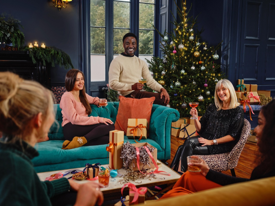 family gathering living room staged lifestyle homebuyers emotional connection