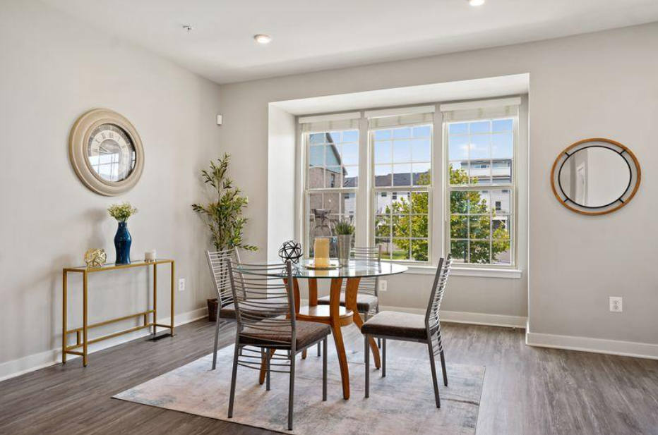 Staged dining room after professional home staging at 5722 Richmanor Terrace Upper Marlboro Maryland by Harvard Home Services