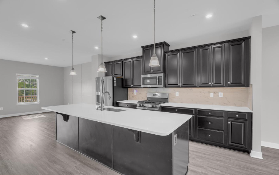 Empty kitchen before professional home staging at 5722 Richmanor Terrace Upper Marlboro Maryland