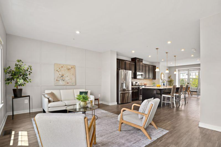Staged open plan living room and kitchen after professional staging at 5722 Richmanor Terrace Upper Marlboro Maryland