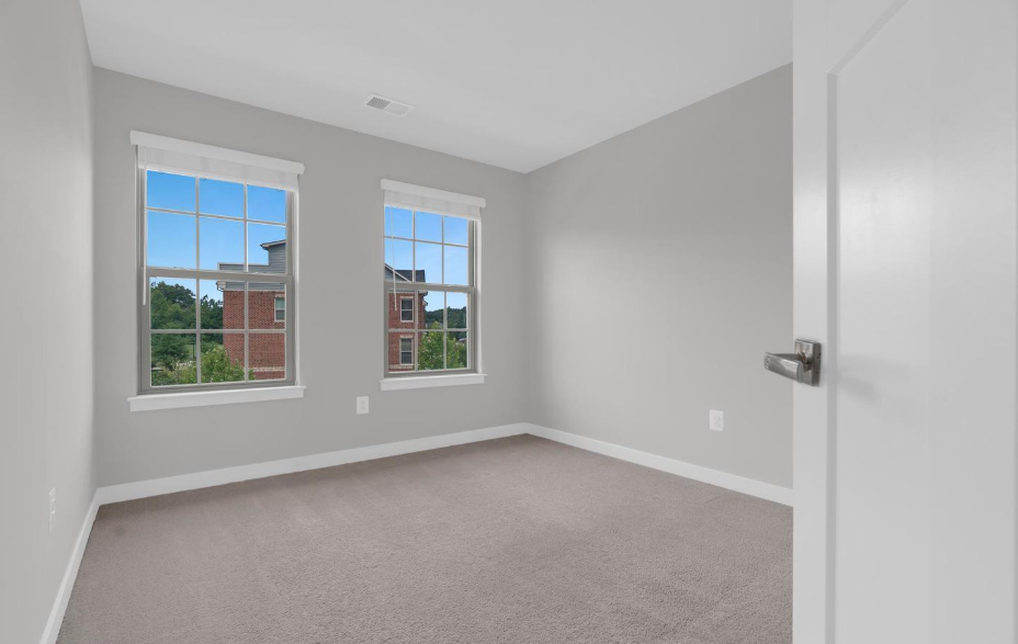 Empty spare bedroom before professional home staging at 5722 Richmanor Terrace Upper Marlboro Maryland