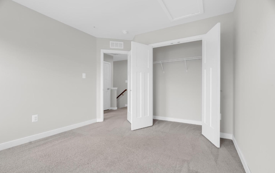 Empty secondary bedroom before professional home staging at 5722 Richmanor Terrace Upper Marlboro Maryland