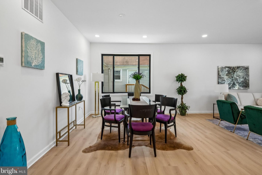Professionally staged dining room with open floor plan, home staging DC metro area by Harvard Home Services